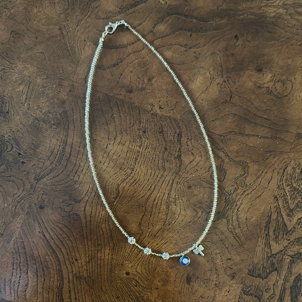 Elegant Gold Necklace with Blue Pendant
